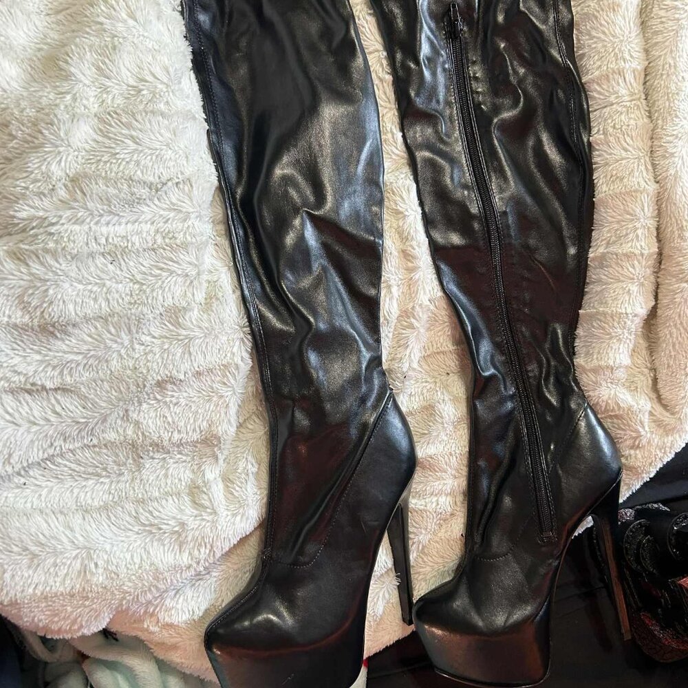 Publicite women’s thigh high boots.  Faux Leather